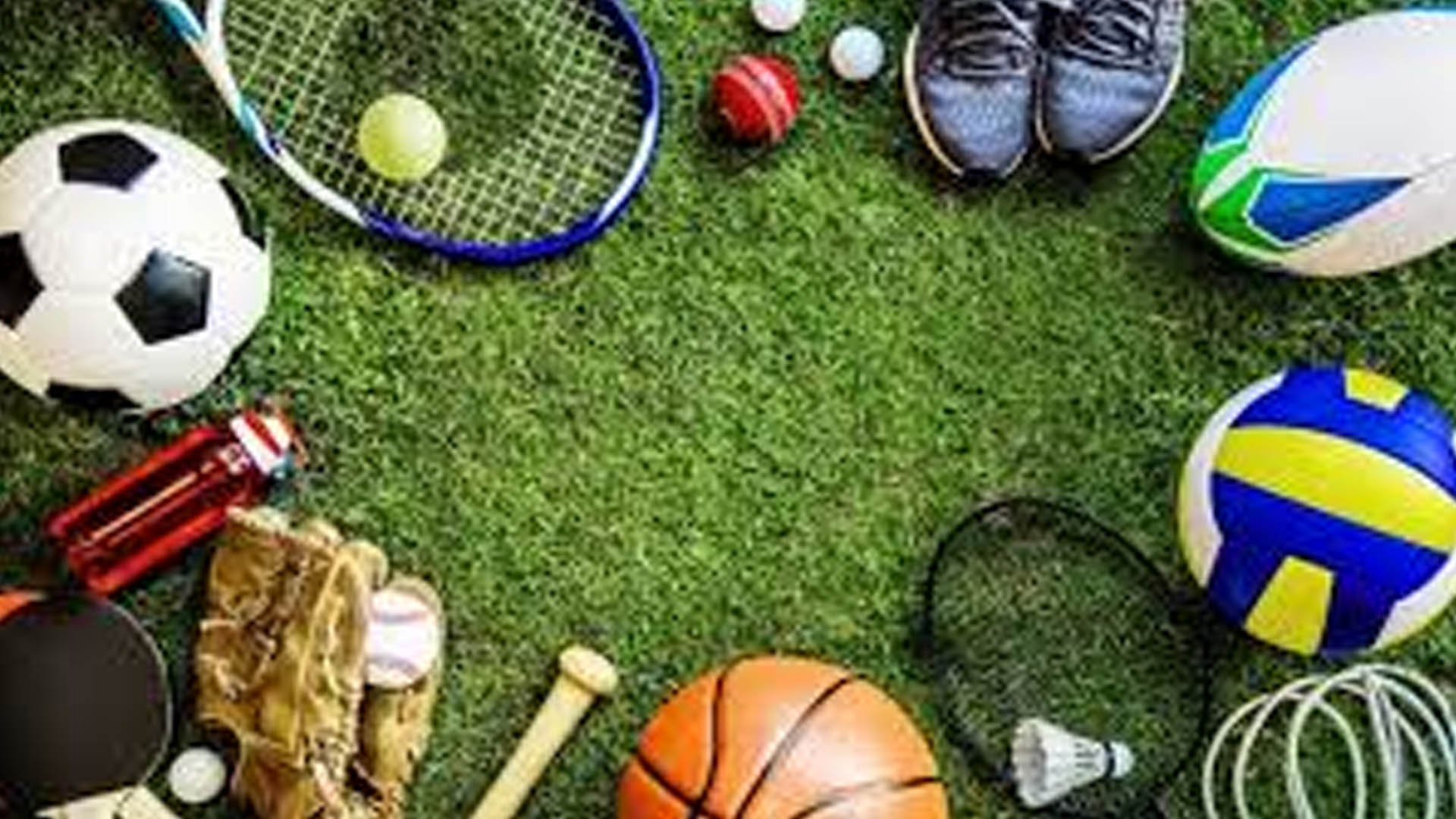 Golf fans walking along a coastal course at sunset